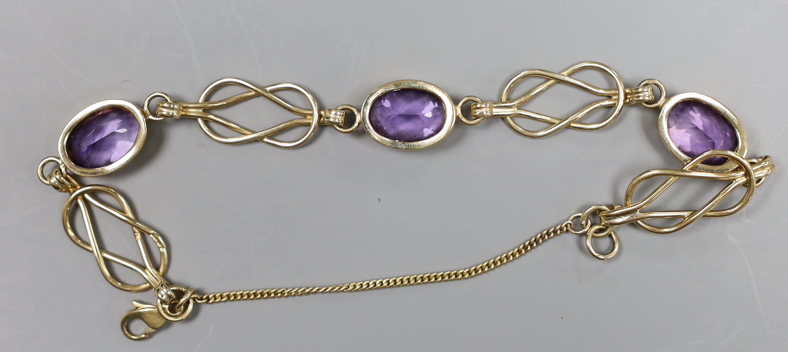 A 9ct gold and amethyst bracelet, gross 16.9 grams